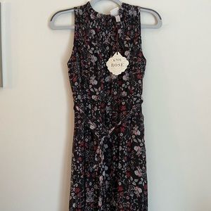 Floral patterned mid-length dress.